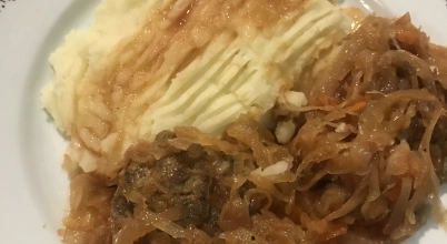 Karkówka pieczona w kapuście  z ziemniakami